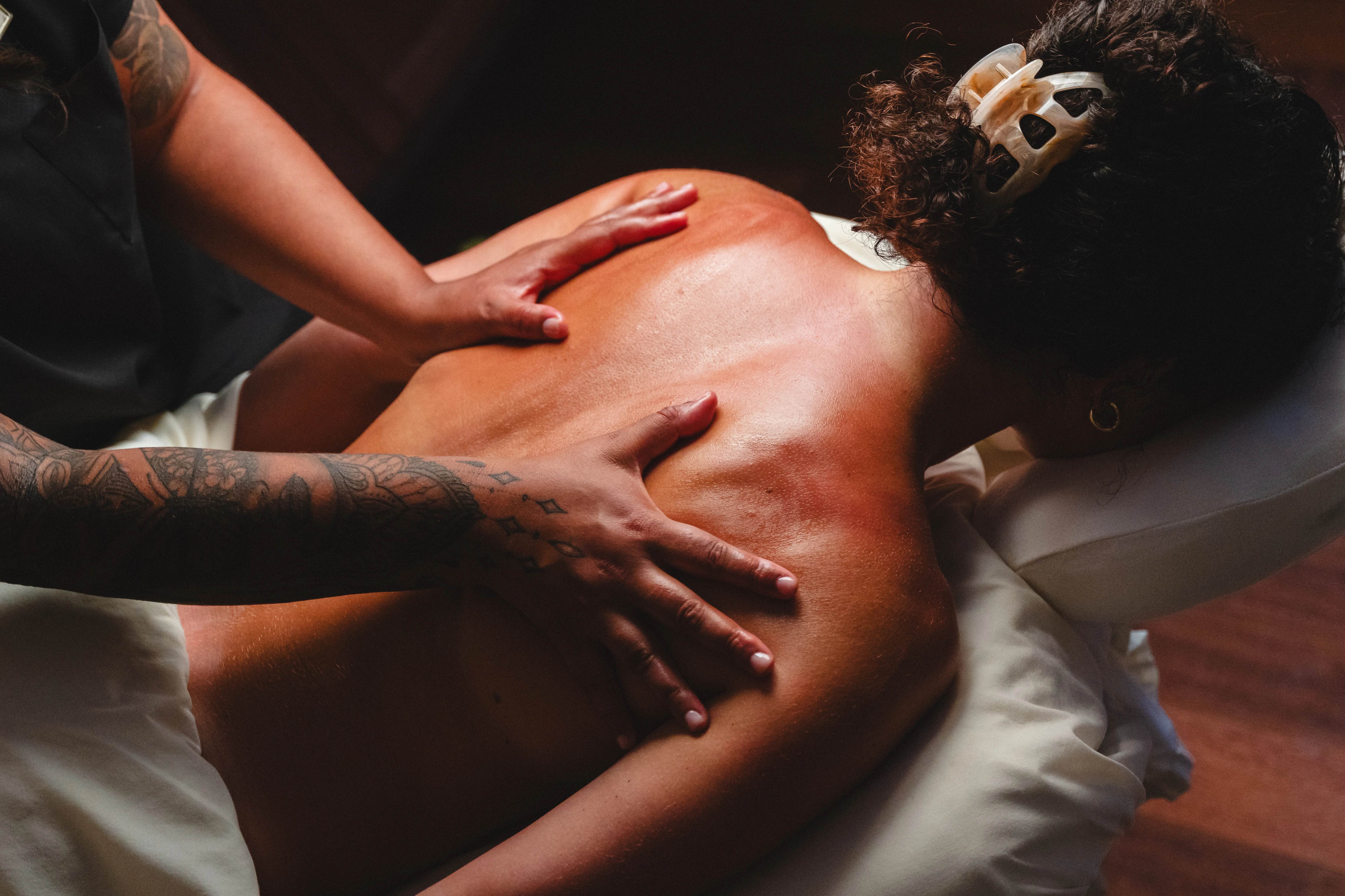 Woman receiving massage treatment